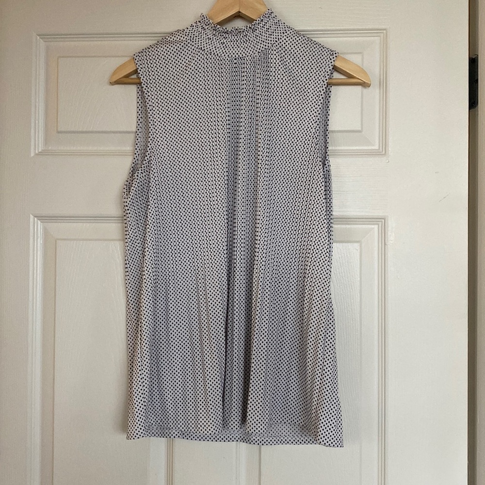 Black and white polka dots. Size medium tank blouse. Perfect for work!